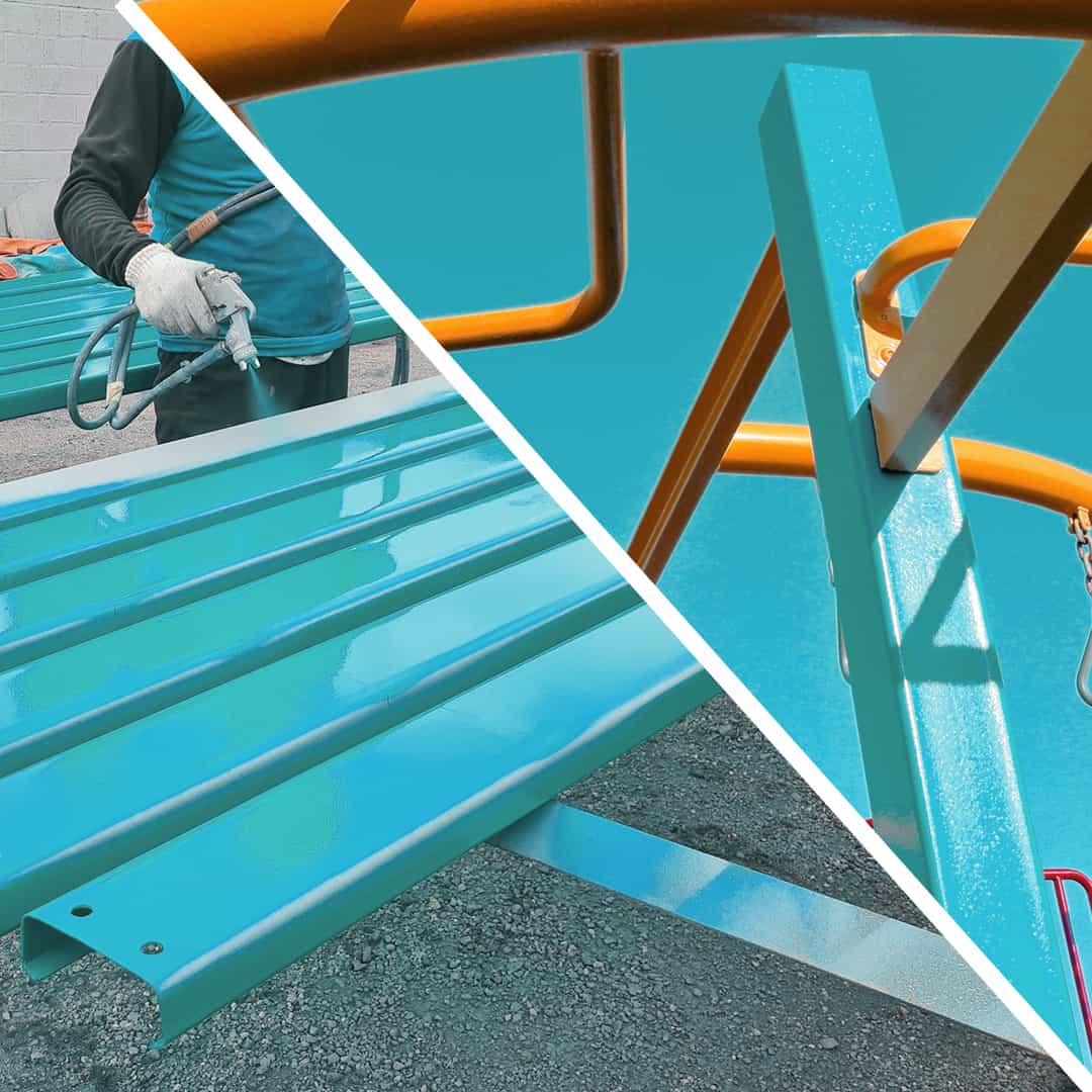 spray painting metal with a blue industrial coating for a playground